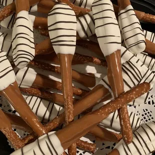 Gourmet Pretzel Spatula's dipped in Caramel White Chocolate and Milk Chocolate Drizzle!