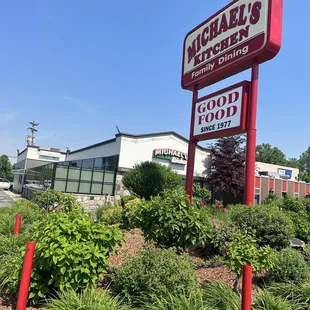 a sign in front of a restaurant