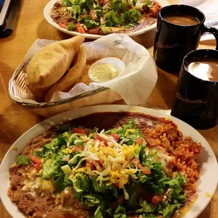 Enchiladas and tamale platters. Order one of each and share.