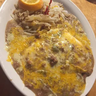 Huevos rancheros with hash and green chile
