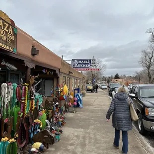 a woman walking down the street