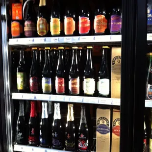 a refrigerator full of bottles