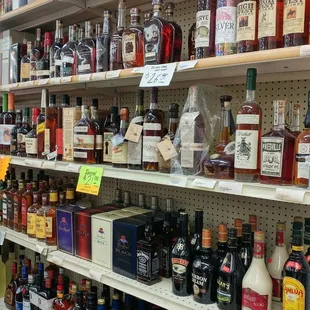 shelves of alcohol and condiments