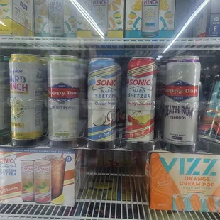 a refrigerator full of sodas