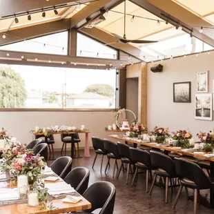 a long table set for a wedding reception