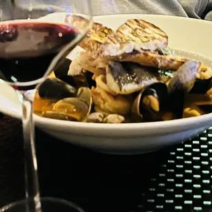 Zuppa Di Pesce and Pinot Noir.