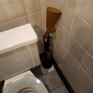 Love the restaurant. I guess I'd rather have gun used to move along a clog, but, it's the least appetizing thing about this peaceful place.