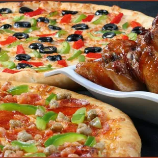 two pizzas with different toppings