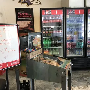a sign in front of a vending machine