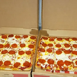 two pepperoni pizzas