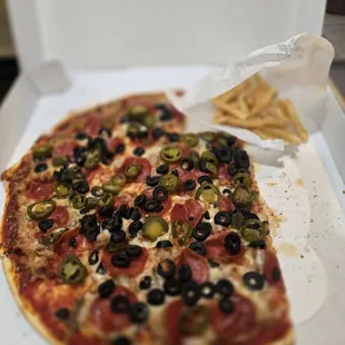 Cheese, Sausage, &amp; Pepperoni, with black olives and jalapeños.