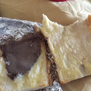 One half of the "Italian Beef".  2 small pieces of beef.  What a joke