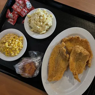 Fried Catfish (right), macaroni &amp; cheese (top left), and corn (bottom left)