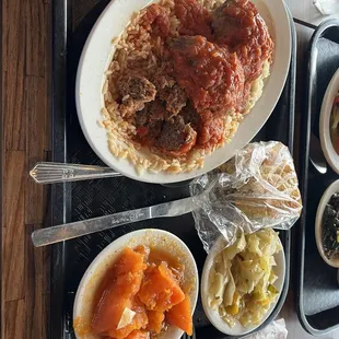 Meatloaf with tomato sauce, yams and cabbage.