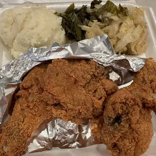 Fried chicken, mashed potatoes, cabbage/collard greens