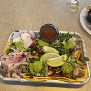 Taco's asada, carnitas, and al pastor.