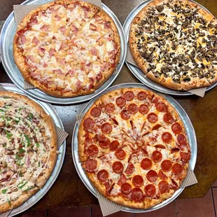 a variety of pizzas
