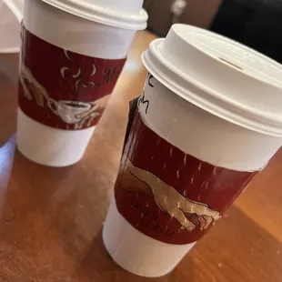 two cups of coffee on a table