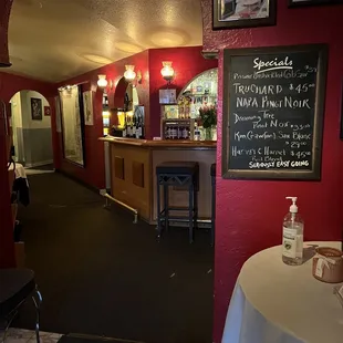 a restaurant with red walls