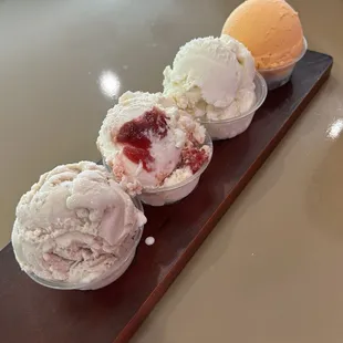 Ice Cream Flight with bananas foster, pineapple upside down cake, Antiguan black pineapple, and Caribbean sunset