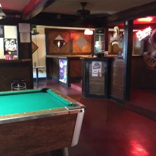 a pool table in the foreground