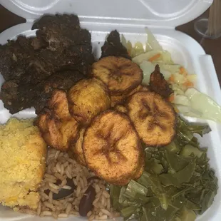 Large Jerk Chicken w/peas &amp; rice, collard greens, cabbage fried plantains and Our famous cornbread.