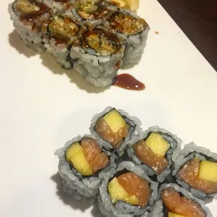 a plate of sushi and a plate of sushi