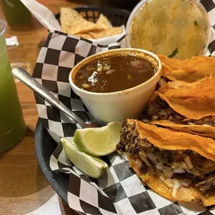Queso Birria taco plate with a pepino lemon agua fresca