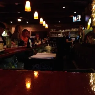 people sitting at the bar