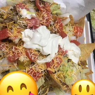 a plate of nachos with sour sour sour sour sour sour sour sour sour sour sour sour sour sour sour