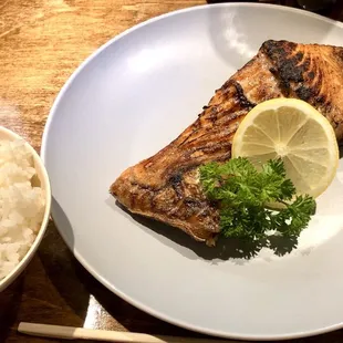 a plate of food and rice