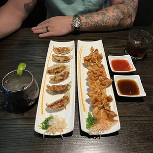 Fried gyoza and crab wontons with their dipping sauces.