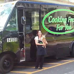 Cooking Fresh food truck with owner Michi in foreground.