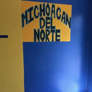a sign on a wall
