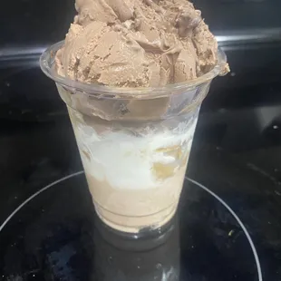 Large cup with brownie ice cream (top), tres leches, and cajeta