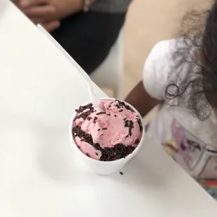 Strawberry ice cream with chocolate sprinkles