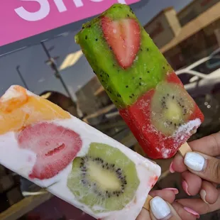 two pops with fruit on them