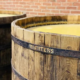 barrels with yellow liquid