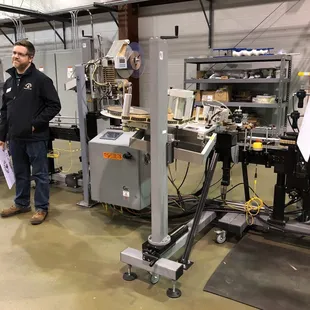 a man standing in a factory