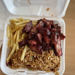 Boneless spareribs and pork fried rice and French fries