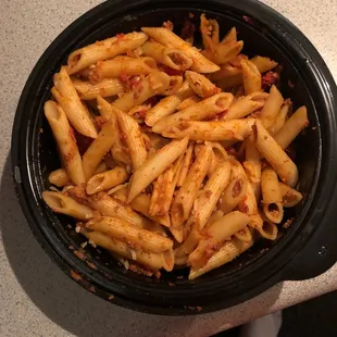 a bowl of pasta with sauce