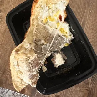 This is the other half of my calzone. There is little toppings. Super sad they have cut back