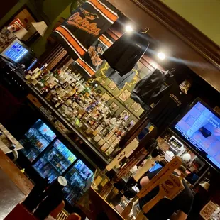 a bar with a television in the background
