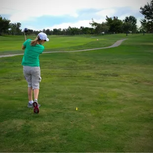 Teeing off on the par 5 15th