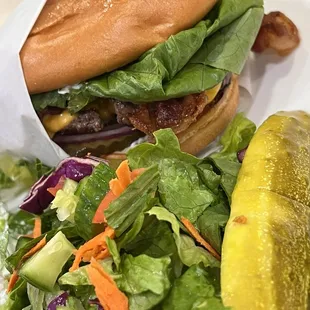 Bacon cheeseburger with a side salad