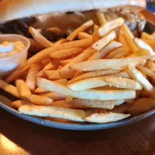 a plate of french fries and a hot dog