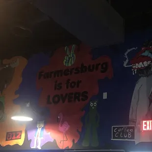 a mural of a man in a suit and tie