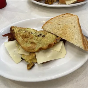 Bacon omelette, add cheese (+$.99)