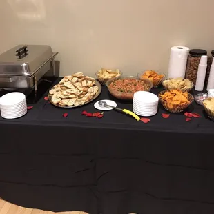 Fruit tray, bruschettas and chips for appetizers