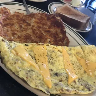 Bacon &amp; Cheese Omelette with hash browns &amp; wheat toast